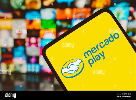 In This Photo Illustration The Mercado Play Logo Seen Displayed On A