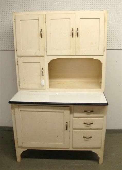 A hoosier cabinet is one of the handiest and most charming things you can have in your kitchen. Vintage White Hoosier Kitchen Cabinet by RoosterRiver on Etsy