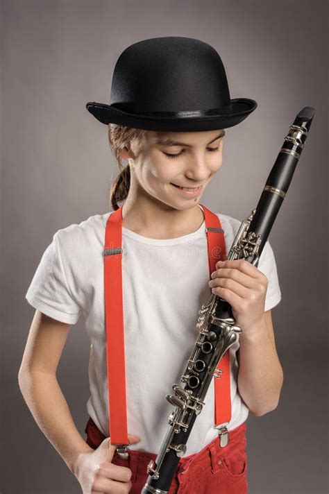 Little Girl Holding A Clarinet Stock Photo Image Of Braces People