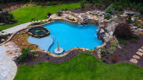 Natural Freeform Pool With Cave And Beach Entry Rustic Pool