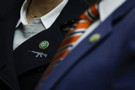 House Republicans Criticized Over Assault Weapon Lapel Pins Mortifying