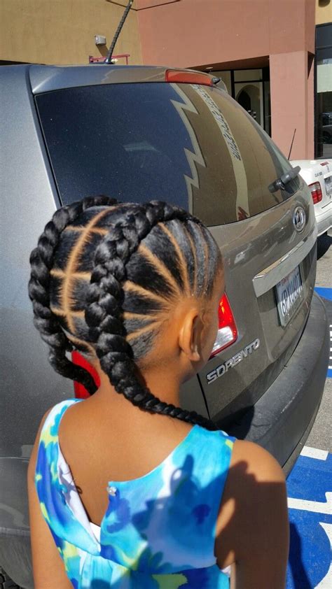 A thin cornrow braid at the crown, with side braids, often fitted with loops, beads, or cowrie shells. Braids by Dej, Meagan | Hair styles, Girls hairstyles ...