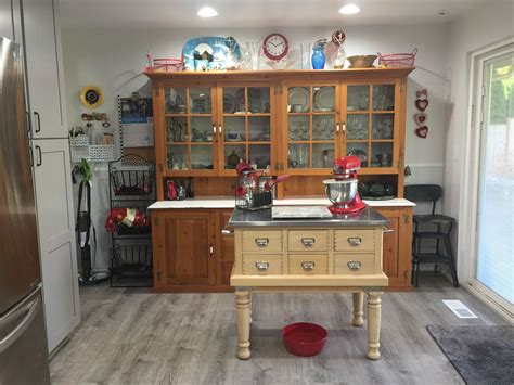But, there is a sense of style over practicality here. Baking station and beautiful natural wood buffet. Old ...