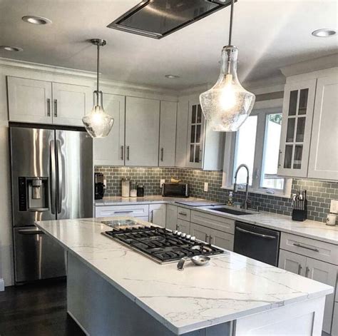 Under cabinet range hoods, wall mounted range hoods Interesting with vent hood in ceiling. Like cabinets ...