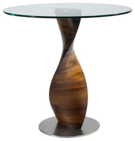 A traditional wooden table is beautiful too, but there depending on the style, this can also offer a formal look that looks fitting for fine dining. Edge 30" Round Glass Dining Table by Mod Decor ...