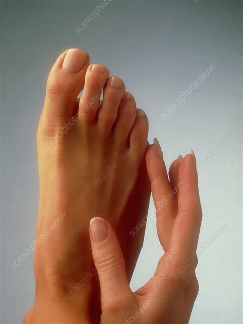 Womans Manicured Hand And Pedicured Foot Stock Image