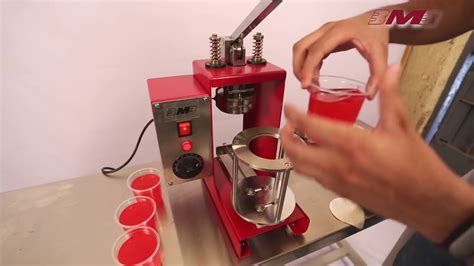 Instead of yanking a lever, you only need to push the cup in and the machine will feed the film and seal in a few seconds. Manual Cup Sealing Machine (For Aluminium Foils) | Doovi