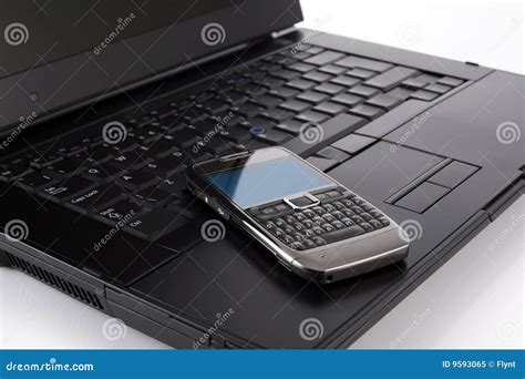 Mobile Phone On Laptop Computer Stock Image Image Of Liquid