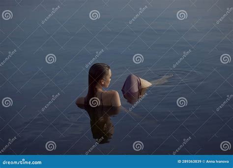 Beautiful Woman Meets Sunset Sitting In Lake Perfect Body Wet Hair