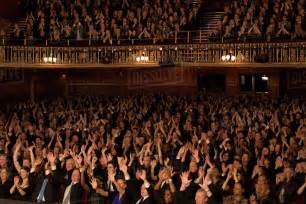 Audience Cheering In Theater Stock Photo Dissolve