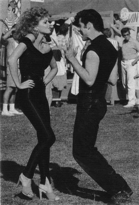 Olivia Newton John In Black Leather Pants At The Movie “grease” Famous Couples Olivia Newton