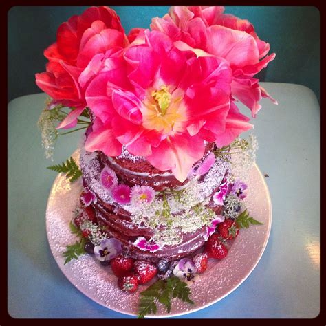 gorgeous naked cake with edible tulips
