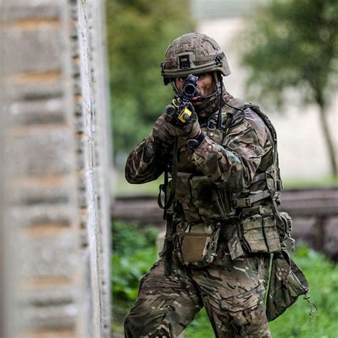 A Royal Marines Commando From X Ray Company 45 Commando In The Thick Of