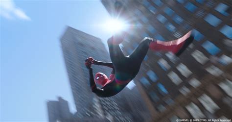 Spider Man Far From Home Spoiler Stills Show Spidey Swinging Through Nyc A Deleted Scene And More
