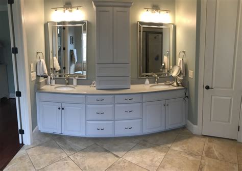 The color scheme is white and pale gray, with lots of natural light. Grayish Master Bath Vanity Update - 2 Cabinet Girls