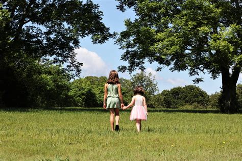 Two Young Sisters Walking In Field Free Stock Photo Public Domain