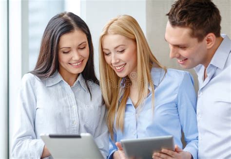 Business Team Working With Tablet Pcs In Office Stock Photo Image Of