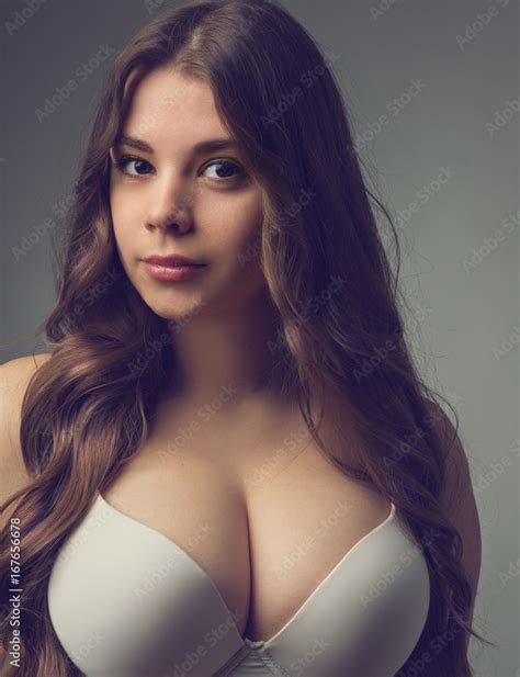 Babe Girl With Big Breasts Posing In A Bra Foto De Stock Adobe Stock