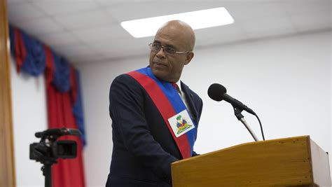 The president of haiti (french: Haiti's president departs to make way for interim government