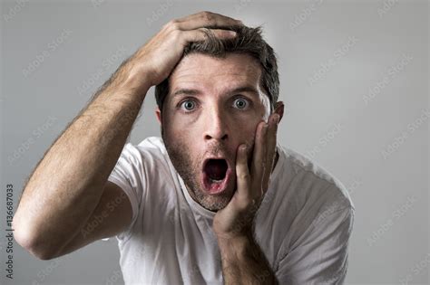 Young Attractive Man Astonished Amazed In Shock Surprise Face Expression And Shock Emotion Foto