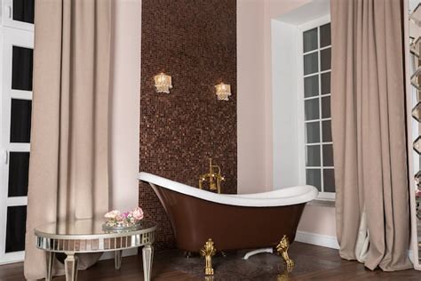 I'm thinking of putting in a freestanding tub, but i'm wondering if i'll need to tile around the tub to prevent water damage on the wall. Do You Need to Tile Around a Freestanding Tub? - The ...