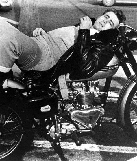 James Dean Lounging On His Triumph In A Classic Leather Motorcycle