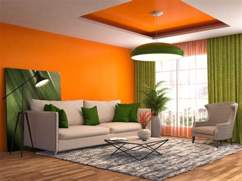pemilihan cat ruang tamu warna orange memberikan nuansa hangat desain