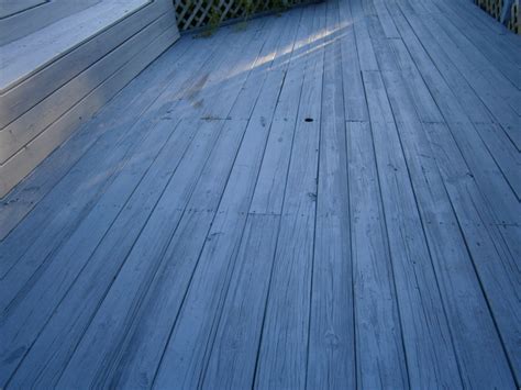 What kind of siding does a blue house have? How To Refinish and Paint an Old Wooden Porch and Deck ...