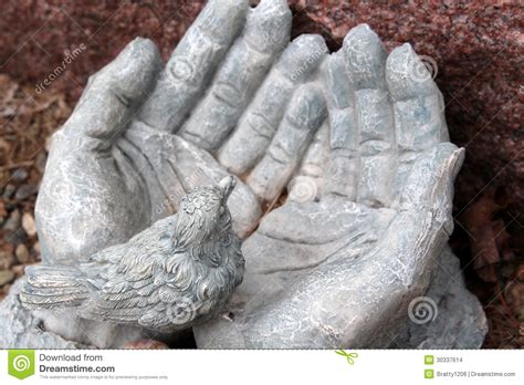 Stone Hands Open And Holding Little Bird In Palm Stock Images Image