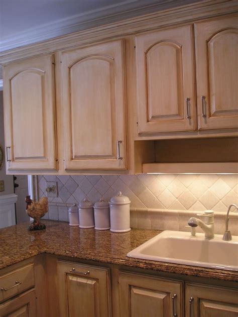 Maybe you would like to learn more about one of these? painted cabinets: linen white and rich brown glaze ...