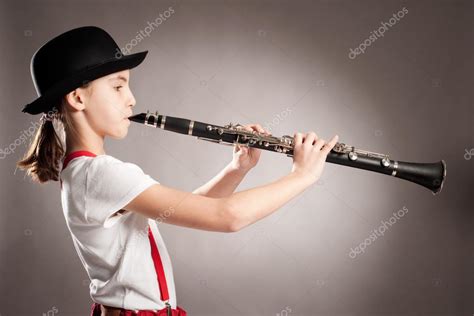Little Girl Playing Clarinet ⬇ Stock Photo Image By