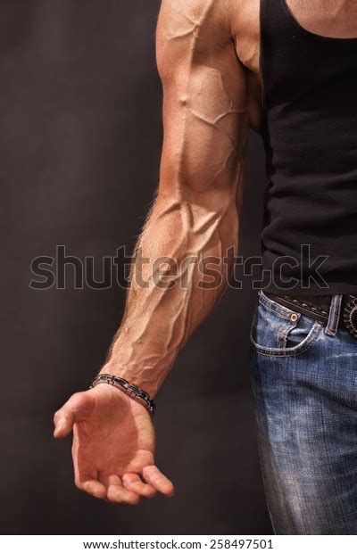 Bodybuilders Hand Arm Veins Protruding Under Foto Stock
