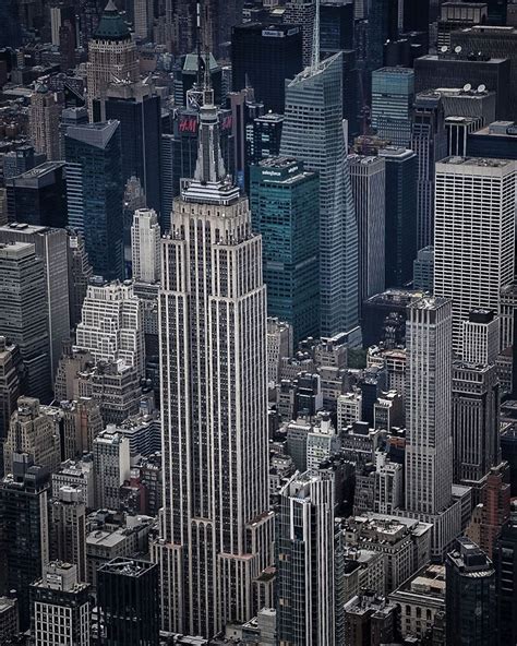 An Aerial View Of The Empire Building And Surrounding Skyscrapers In