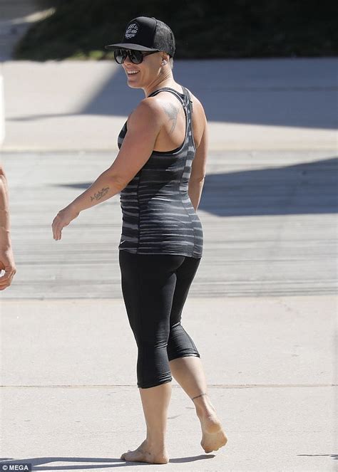Pink Shows Off Her Toned Figure In Activewear As She Enjoys A Jog On
