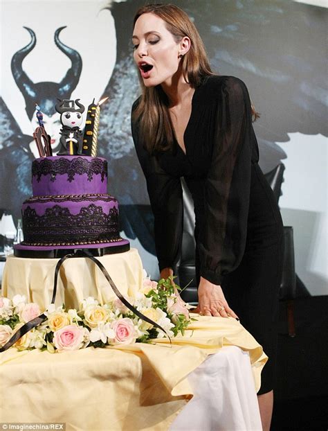 Angelina Jolies Enchanting Birthday Celebration In China Blowing Out