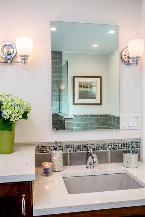 A beautiful alternative to standard bathroom backsplash tiles in this rustic cabin remodel. Bathroom Sink With Mosaic Tile Backsplash | Mosaic tile ...