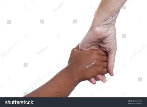 Young Dark Skinned Mixed Race Girls Hand Holding Older Fair Skinned Senior Womans Hand