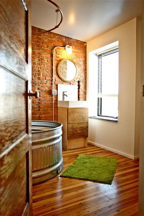 This bathroom blends into the white decor other great style elements are the twin sink basins and white brick wall. 27 Absolutely Gorgeous Bathroom Design Ideas With Brick Walls