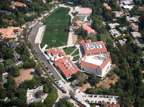 An Aerial View Of A Soccer Field And Surrounding Buildings