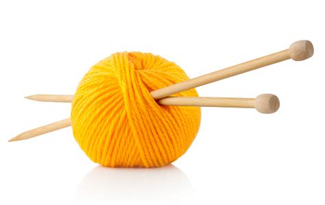 Yellow Ball Of Wool With Knitting Needles Stock Photo Download Image