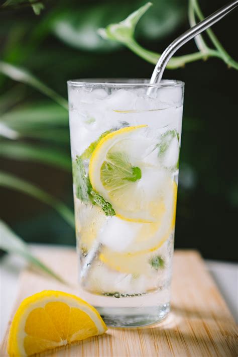Clear Drinking Glass Filled With Lemon Photo Free Beverage Image On Unsplash