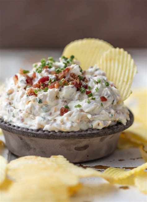 Perfect for super bowl festivities, this bacon onion dip will impress the entire tailgate. Caramelized Onion Bacon Dip - The Cookie Rookie