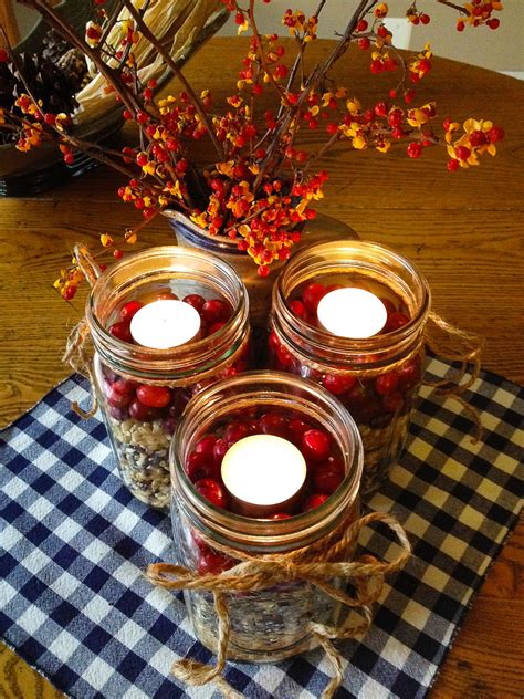 Simple Fall Centerpiece With Mason Jars Popcorn Fresh Cranberries And