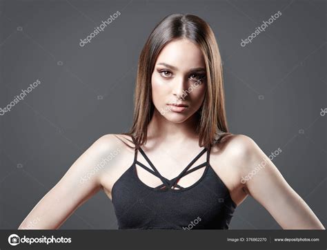 Attractive Fashion Model Posing Studio Black Top Gray Background Beauty