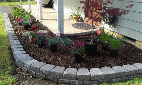 Using a garden trowel, pour polymeric sand into the spaces between the edging (image 1). there is not a hard task to make flower beds and what is even better is that you may do t ...