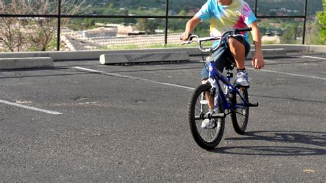 Hold the bike handlebar on the bend point with your right hand. How to Ride a Bike With One Hand: 8 Steps (with Pictures)