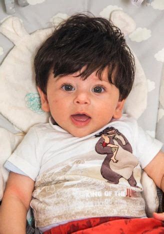 A baby boy has been dubbed mowgli thanks to his mop of thick black hair, which was so long it showed up on the baby scan. A Baby Born With Long Jet Black Hair Has Got Everyone's ...