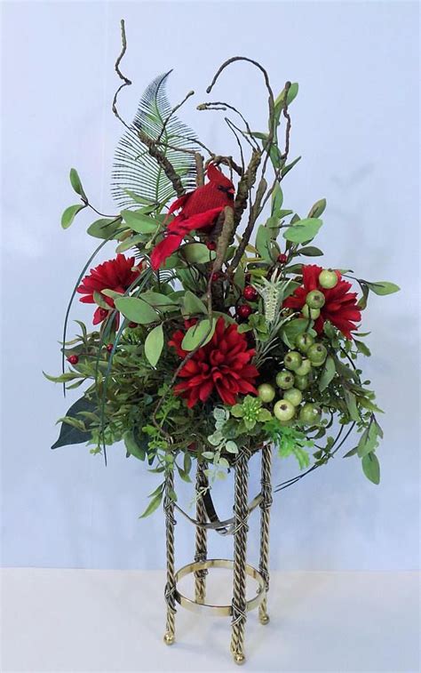 Contact the funeral home that is in charge of the funeral service and ask for a florist that they recommend or work with frequently. Cardinal Bird Floral Arrangement Unique Centerpiece ...