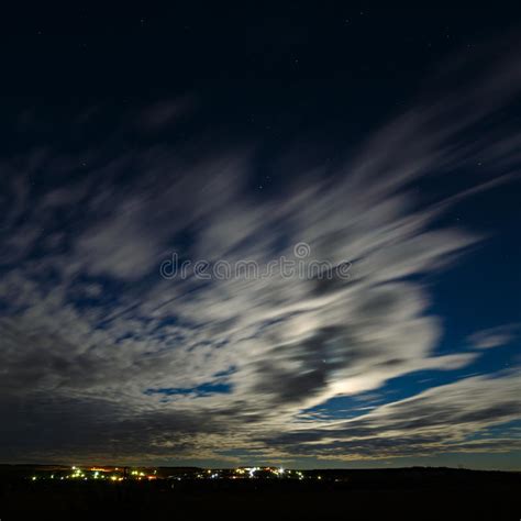 Night Landscape With A Full Moon Starry Sky Clouds Stock Photo
