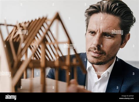 Architect Examining Architectural Model Stock Photo Alamy